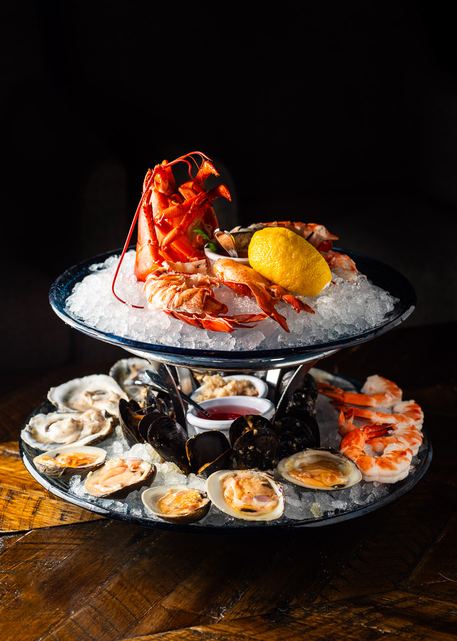Shadows-on-the-Hudson-Summer2026-specials-entrees-22 Seafood tower with lobster, oysters, shrimp, and lemon.